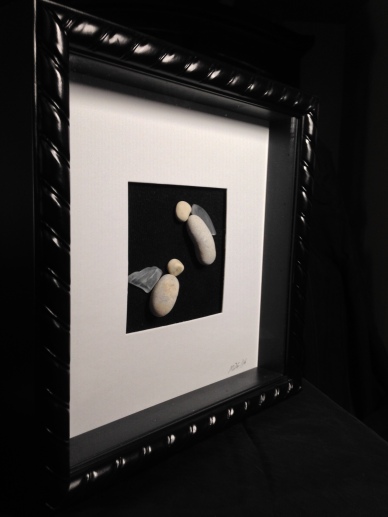 Stone Angles with glass wings. 10"x10" shadow box frame